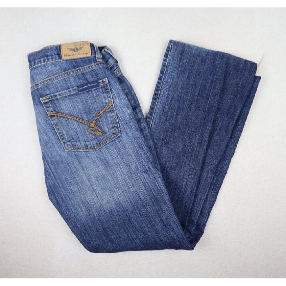 UNCHARTED TERRITORY WOMEN'S MEDIUM WASH DISTRESSED BOOT CUT JEANS SIZE 27 SHORT